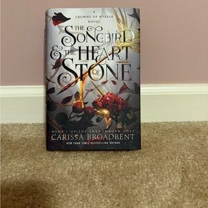 The Songbird & The Heart of Stone Book
